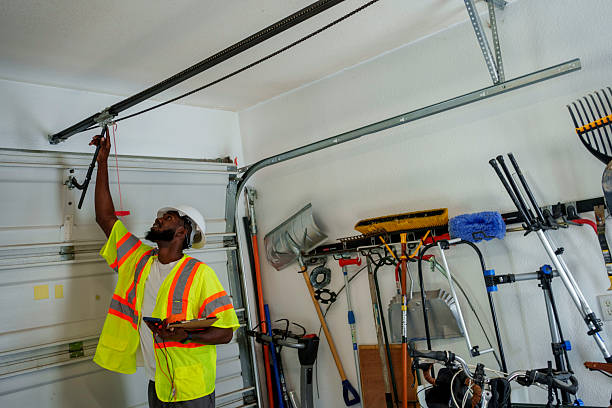 Professional Garage Door Panel Replacement technician working in Elm City, NC